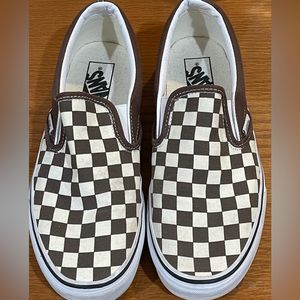 Men’s size 7 checkerboard Vans slip ons.